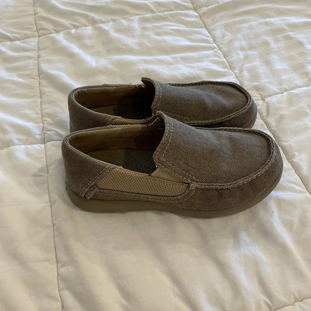 2 pair of size 13C Crocs slip on dressier shoes.